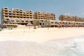 Villas Marlin KM 13.5 hotel zone, 1,2,3 and 4 bedroom condos available. Older building but very nicely updated with great location 