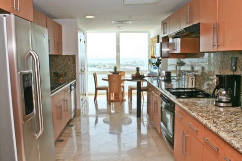 Another view of the ultra modern fulll kitchen 