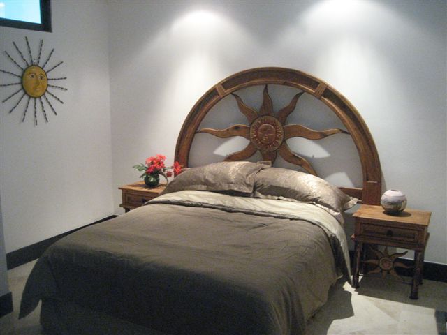 Bedroom 3 offer a queen size bed, sliding mirroed door closet with built in drawers and shelves, and 32 inch lcd tv