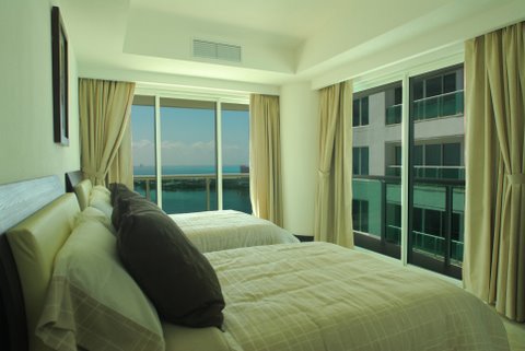 Guest suite 3 with city view terrace, full bath, walk in closet and 32 inch lcd tv