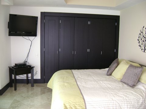 Guest Suite 2 with full bath and access to oceanfront terrace