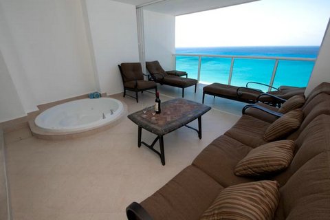 huge 250 square foot oceanfront patio with jacquzzi, and luxury outdoor furniture