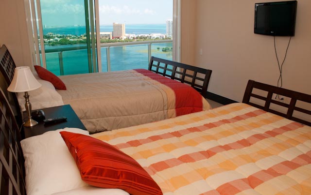 Guest suite 3 with city view terrace, full bath, walk in closet and 32 inch lcd tv