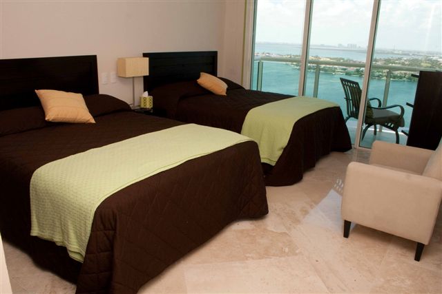 Guest Suite 3 with full bath and access to terrace